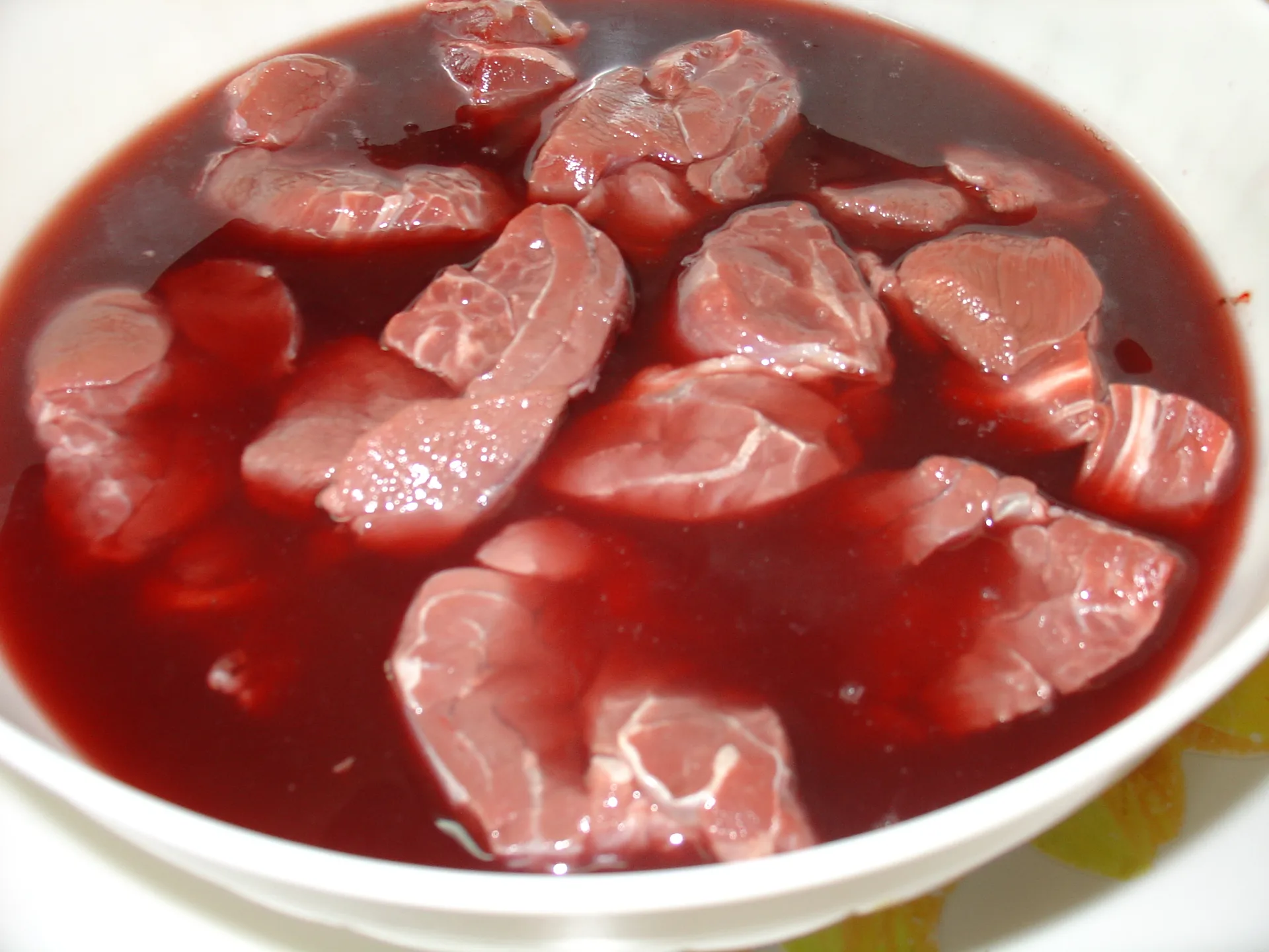 Brasato di carne marinata ( con vino rosso di Troia )