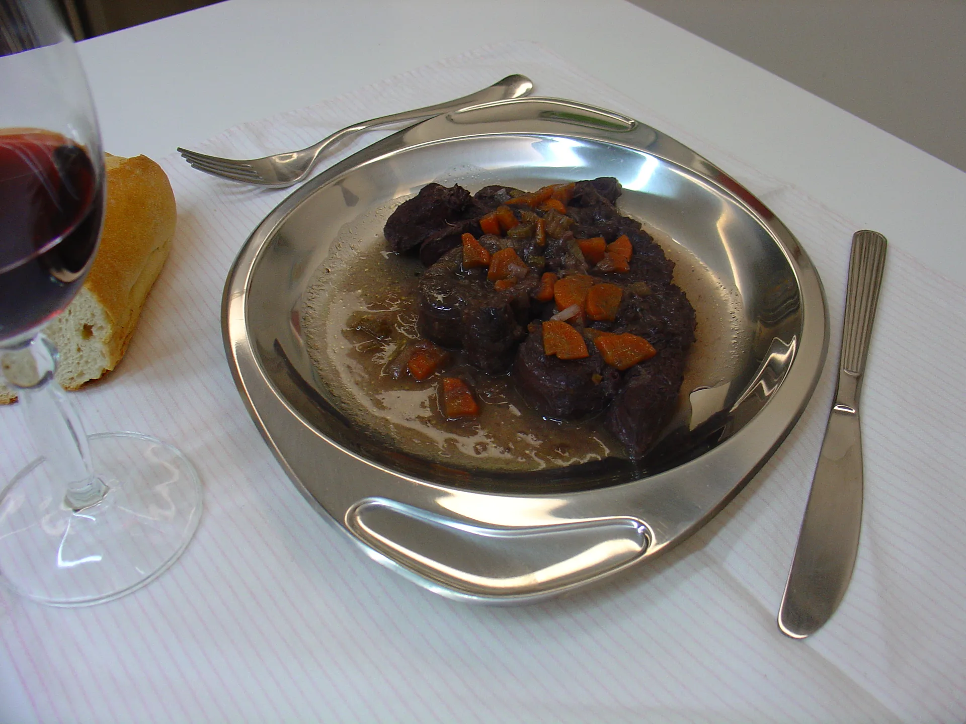 Brasato di carne marinata ( con vino rosso di Troia )