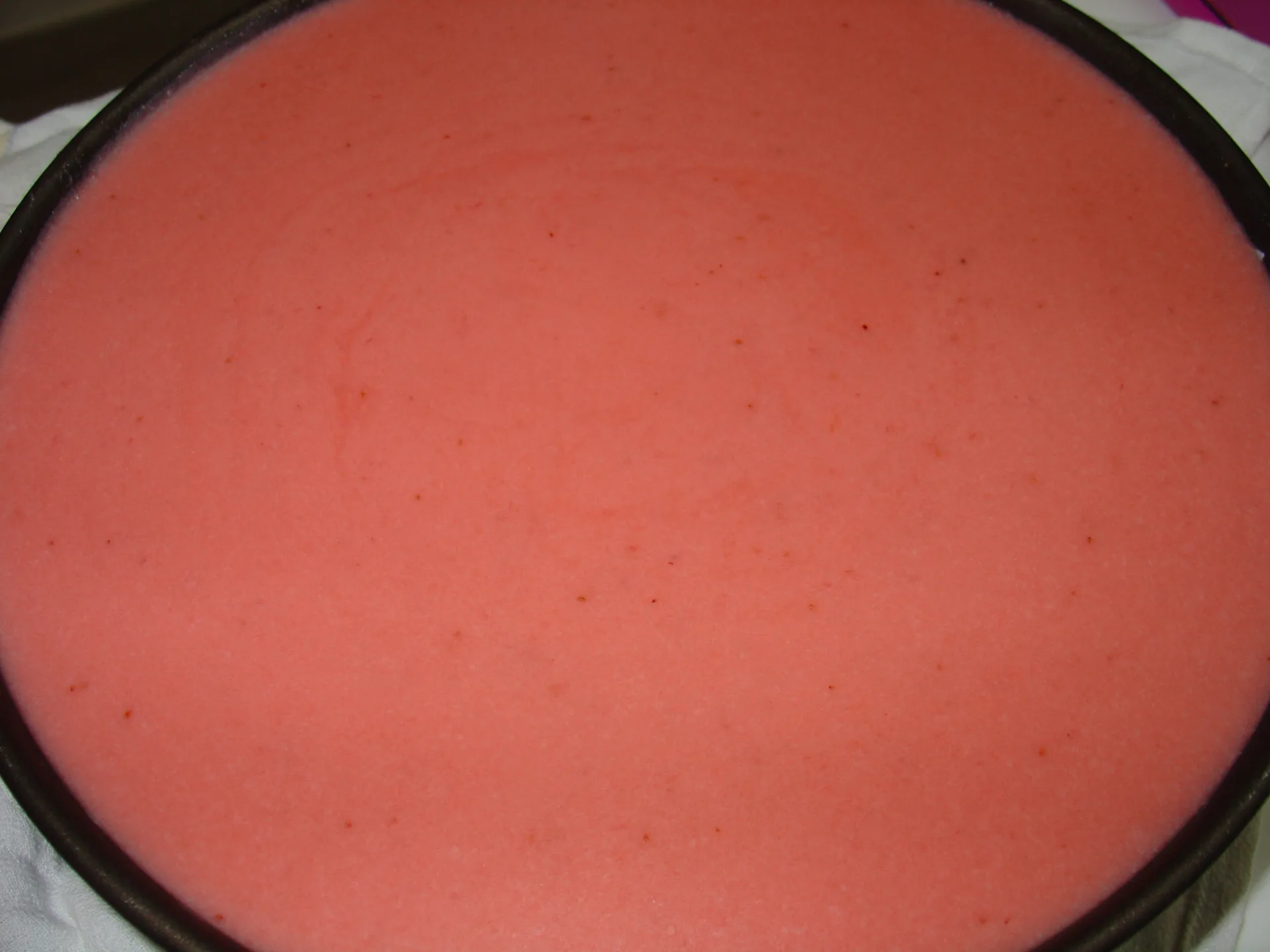 Cheesecake geleè al cioccolato con mousse di fragole e cuore di arancia