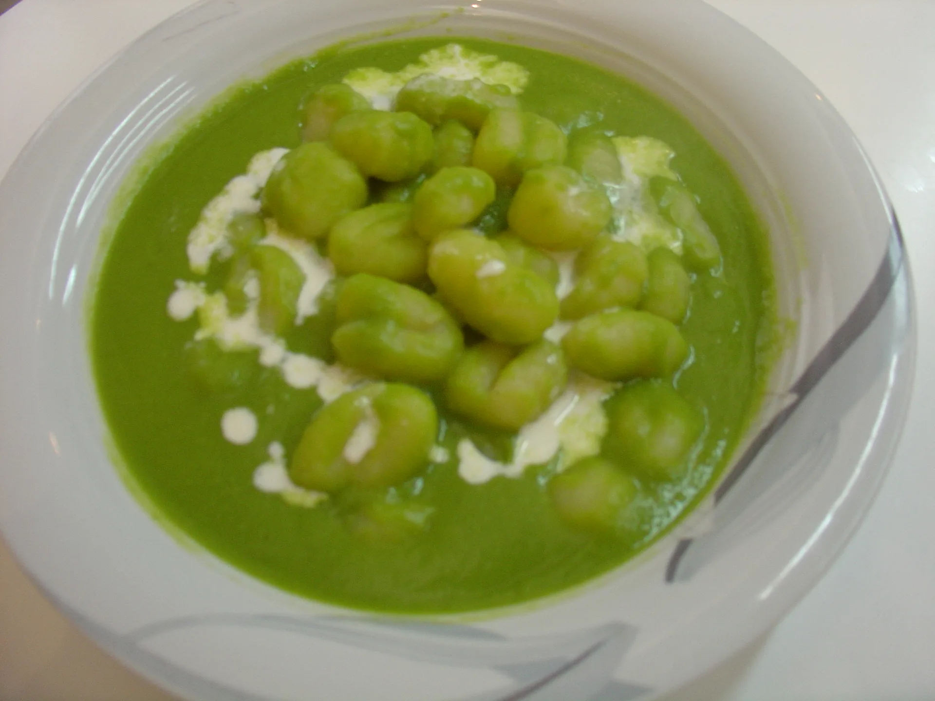 Gnocchi su vellutata di piselli