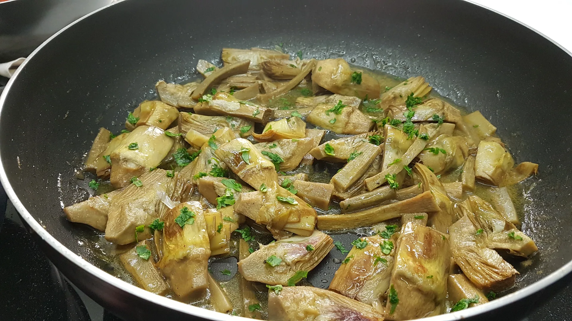 Scaloppine di vitello con carciofi all'arancia