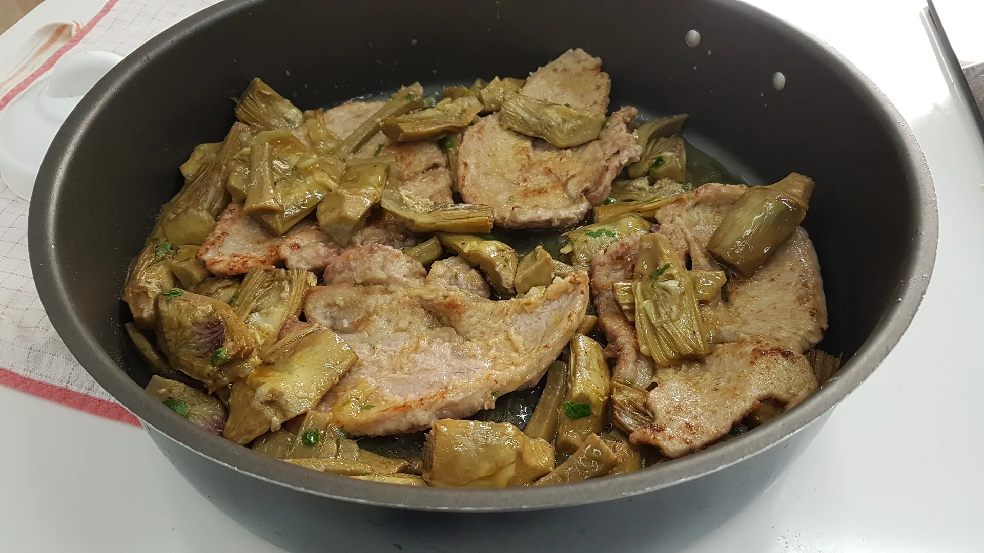 Scaloppine di vitello con carciofi all'arancia
