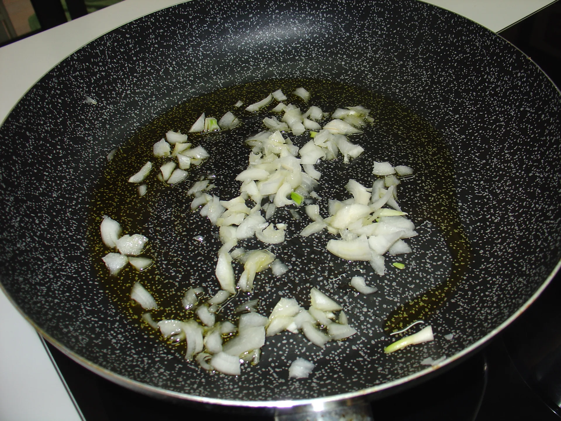 Spaghetti risottati con funghi e zafferano