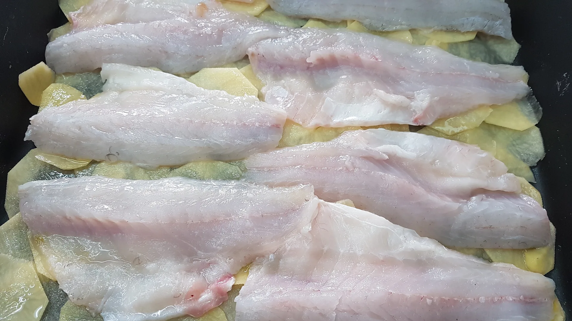 Spigola in crosta con patate